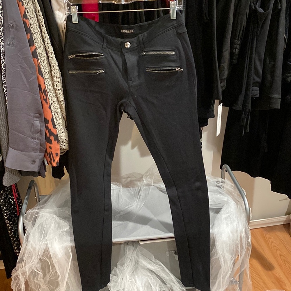 Express stretch pants with a little edge zippers at the top